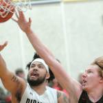 COLLEGE BASKETBALL: Trojans’ second-half bombs too much for PC