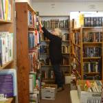 Volunteer Margaret Yates shelves books for the Friends of Sequim Library book sale on Feb. 8. (Matthew Nash/Olympic Peninsula News Group )