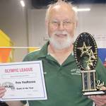 BOYS SWIMMING: Port Angeles fares well at divisional meet; Van Rossen voted coach of the year