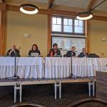 Jefferson County commissioners David Sullivan, left, Kate Dean and Greg Brotherton, along with county administrator Philip Morley and deputy civil prosecuting attorney Philip Hunsucker, conducted a public hearing regarding a possible extension to the current shooting range moratorium at Fort Worden on Monday afternoon. (Zach Jablonski/Peninsula Daily News)