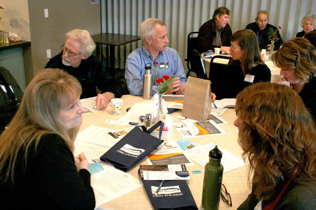 Owen Rowe, a Port Townsend City Council member who also is the president of the board for The Food Co-op, discusses potential solutions to the housing crisis during the monthly luncheon for the Chamber of Jefferson County at the Elks Lodge in Port Townsend. (Brian McLean/Peninsula Daily News)