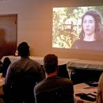 Justine Gonzalez-Berg, the network weaver for the Housing Solutions Network, presents a video Monday during the monthly luncheon provided by the Chamber of Jefferson County at the Elks Lodge in Port Townsend. She appears in the video with others and uses it as a way to facilitate conversations with community groups on the impact of housing. (Brian McLean/Peninsula Daily News)