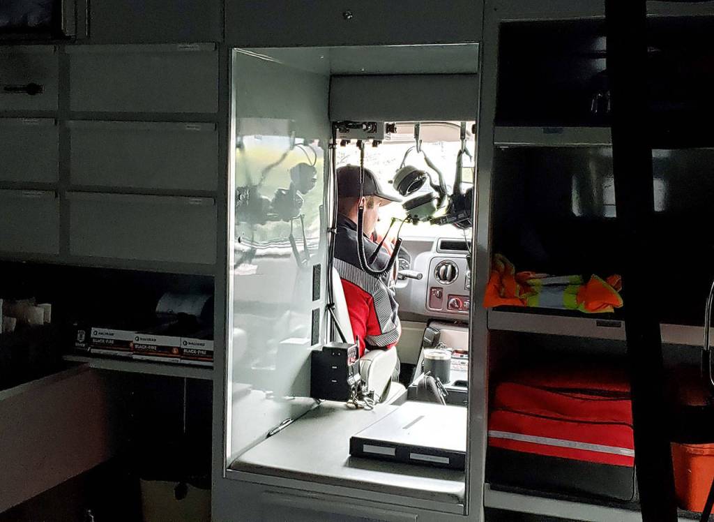 Lt. Jeremy Church drives an ambulance to a traffic incident on the Tumwater Truck Route in Port Angeles. (Laura A. Foster/Peninsula Daily News)