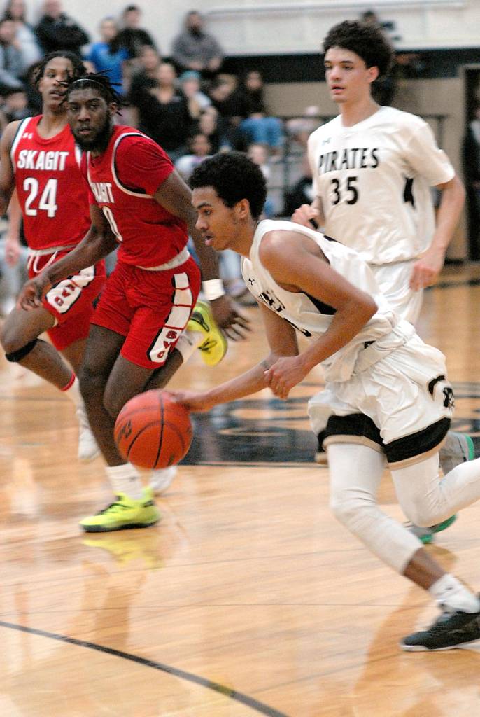 MEN’S BASKETBALL: Sequim’s Despain hits winning free throws as Peninsula rallies past No. 1 Skagit Valley