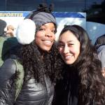 U.S. Navy sailors Dasia Gray, left, and Anahi Rosales greet each other Tuesday outside of the Chamber of Jefferson County in Port Townsend. The best friends hadnt seen each other in two months. (Brian McLean/Peninsula Daily News)