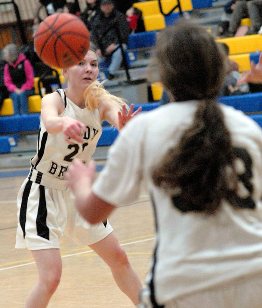 Keith Thorpe/Peninsula Daily News Clallam Bays Cedar Johnson, left, pass to teammate Jasmine Tinoco during the first quarter against Cedar Park Christian on Saturday in Joyce.
