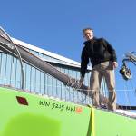 Team FAST Skipper Odin Smith stands aboard his teams vessel Wednesday morning. The team recently purchased the boat on Monday and though it has not been christened yet, it has been nicknamed the Limey Bastard. (Zach Jablonski/Peninsula Daily News)