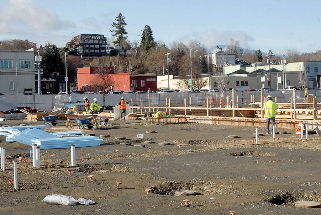 Foundation work continues Wednesday at the site of the future Field Arts & Events Hall, part of the Port Angeles Waterfront Center development. (Keith Thorpe/Peninsula Daily News)