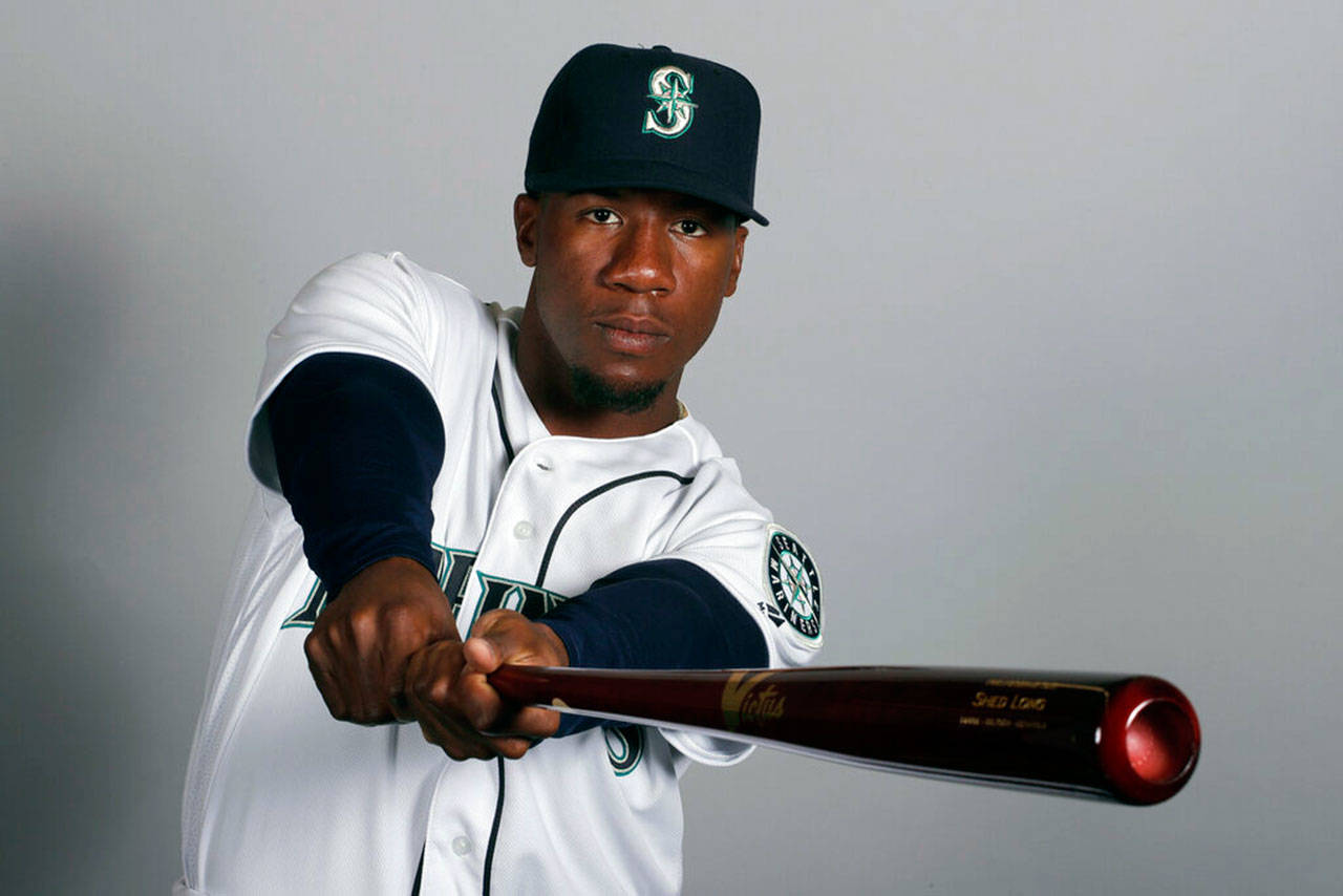 This is a 2019 photo of Shed Long of the Seattle Mariners baseball team. This image reflects the Seattle Mariners active roster as of Monday, Feb. 18, 2019, when this image was taken. (Charlie Riedel/The Associated Press)