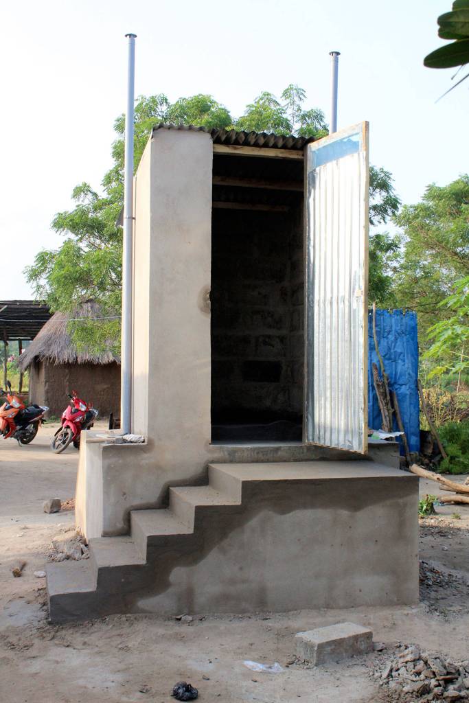 Dignity toilets in Togo, Africa, have a catch basin underneath that converts human excrement into fertilizer. (Doc Reiss)