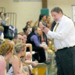 Michael Poindexter, head coach for the Port Angeles girls basketball team, speaks to his team in 2014. (Keith Thorpe/Peninsula Daily News)