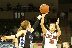 Chris Johnson/for Peninsula Daily News Neah Bays Allie Greene puts up a shot during the Red Devils 58-49 Class 1B state quarterfinal loss to No. 3 Oakesdale on Thursday at Spokane Arena.