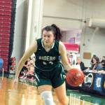 Jaida Wood looks to drive to the hoop as Port Angeles attempts a late comeback in her teams 2A state tournament consolation game. (Mark Krulish/Kitsap News Group)