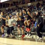Photos by Chris Johnson/for Peninsula Daily News The Neah Bay bench celebrates CeiJ Gagnons tying 3-point shot with 12 seconds left against Curlew at the Class 1B Girls Basketball State Tournament at Spokane Arena.