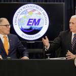 Vice President Mike Pence, right, talks with Washington Gov. Jay Inslee, left, during a meeting with officials Thursday, March 5, 2020, at Camp Murray in Washington state to discuss the states efforts to fight the spread of the COVID-19 coronavirus. (Ted S. Warren/The Associated Press)