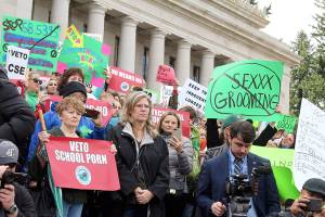 Protesters urge governor to veto sex education legislation