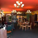 Alchemy Bistro, Empty Chairs, Empty Bar: Prior to the orders to close the Alchemy Bistro and Wine Bar began to practice social distancing by strategically placing tables far apart from each other and limiting its guest number. (Ken Park/Peninsula Daily News)