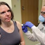 Volunteers test experimental COVID-19 vaccine