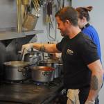 Ryan Quiroz and Alicia Taylor help prepare food at Nourish Sequim on Thursday, March 26, 2020. Nourishs Meals for Medics GoFundMe drive, a program to provide meals for Olympic Medical Center workers, recently topped its initial goal of $10,000. (Michael Dashiell/Olympic Peninsula News Group)