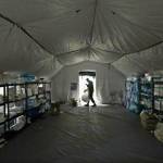 Help heads to NYC as experts predict over 100,000 US deaths