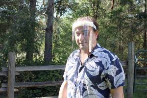 Volunteers work to provide protection against COVID-19