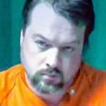 Matthew Wetherington, left, appears on video in Clallam County Superior Court Monday. Wetherington, accused of killing his wife and three children, was ordered held in the Clallam County jail on $5 million bail.