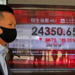 Stocks sink on Wall Street as grim economic news pours in