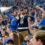 The Associated Press St. Louis Blues fans cheer as they watch television coverage of Game 7 of the teams NHL hockey Stanley Cup Final against the Boston Bruins, from seats at Enterprise Center in St. Louis in June 2019.                                In this June 12, 2019, file photo, St. Louis Blues fans cheer as they watch television coverage of Game 7 of the teams NHL hockey Stanley Cup Final against the Boston Bruins, from seats at Enterprise Center nin St. Louis. With the distinct possibility of pro sports resuming in empty venues, a recent poll suggests a majority of U.S. fans wouldnt feel safe attending games anyway without a coronavirus vaccine. (Scott Kane/The Associated Press file)