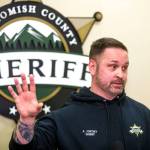 In this Jan. 28, 2020 photo, Snohomish County Sheriff Adam Fortney holds a press conference in Everett, Wash., explaining why he reinstated two deputies who were fired for violating policy. Fortney, the sheriff of Washington states third largest county, says he wont enforce Gov. Jay Inslees stay-at-home order to slow the spread of the coronavirus, saying it violates peoples constitutional rights. (Andy Bronson/The Herald via AP)