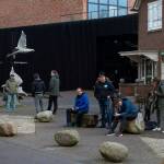 In this Monday, March 30, 2020, file photo, journalists wait outside the Singer Museum in Laren, Netherlands, where a Van Gogh painting was stolen. A Dutch crime-busting television show has aired security camera footage showing how an art thief smashed his way through reinforced glass doors at a museum in the early hours of March 30. He later hurried out through the museum gift shop with a Vincent van Gogh painting tucked under his right arm and the sledgehammer in his left hand. (AP Photo/Peter Dejong, File)