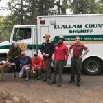 The Clallam County Sheriff Search and Rescue team poses for a photo after saving a 7-month-old puppy named Zola.