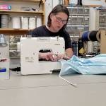Group steps in to sew reusable hospital gowns