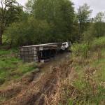 A semi carrying propane tanks flipped over at Leland Cutoff Road in Quilcene at approximately 8 a.m. Wednesday, May 6, 2020. U.S. Highway 101 is fully blocked from the state Highway 104 interchange to Center Road and will be until the semi can be turned upright and towed. (Washington State Trooper Chelsea Hodgson)