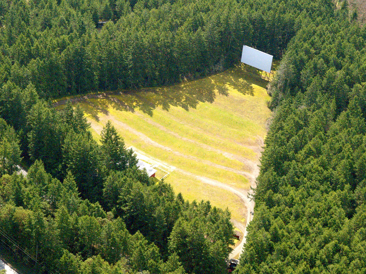 Port Townsends Wheel-In Motor Movie drive-in awaits Friday night, when it will allow up to 70 cars in for a double feature at dusk. The venue is expected to run classic movies for the next several weekends. (Wheel-In Motor Movie)