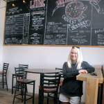 Barhop Brewing and Artisan Pizza manager Jackie Somers will oversee a restaurant with reduced seating capacity and a policy of giving area residents and regulars priority seating during busy hours. (Keith Thorpe/Peninsula Daily News)