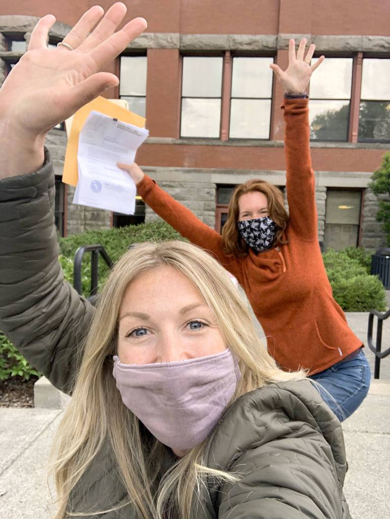 Jesse Michaels, front, and Terra Coyan celebrate after procuring the deed to the Swansonville church. (Jessie Michaels)