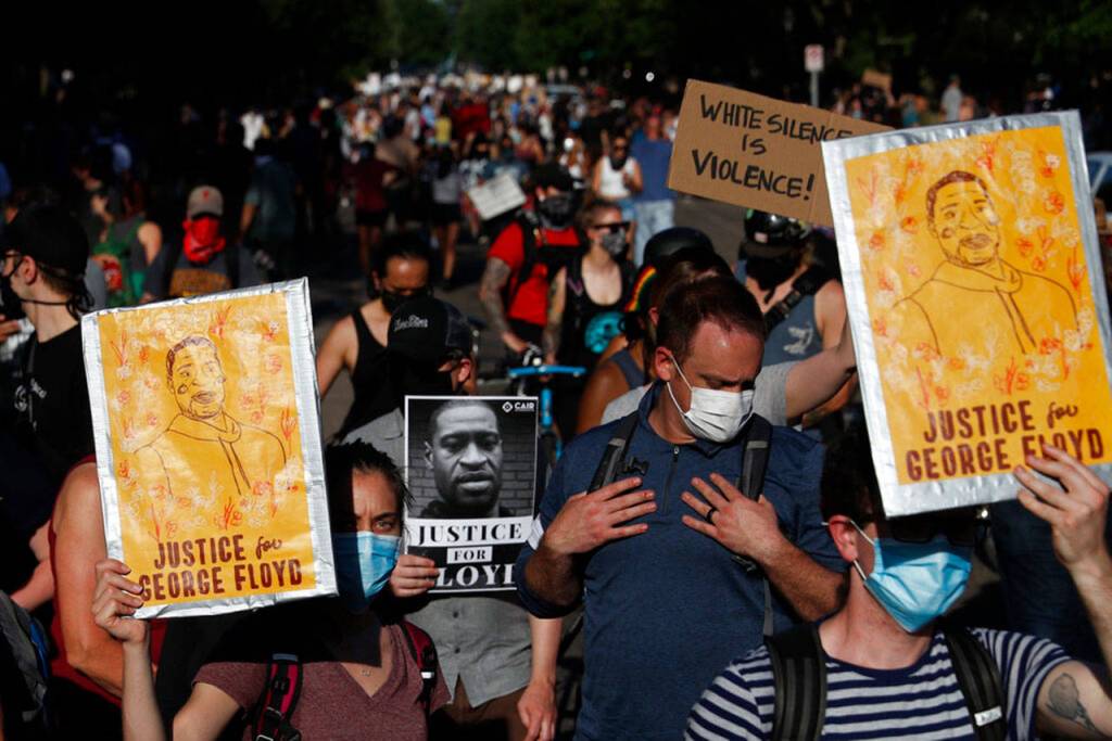 Demonstrators gather at the Minnesota governors mansion Monday, June 1, 2020, in St. Paul, Minn. Protests continued following the death of George Floyd, who died after being restrained by Minneapolis police officers on Memorial Day. (John Minchillo/Associated Press)
