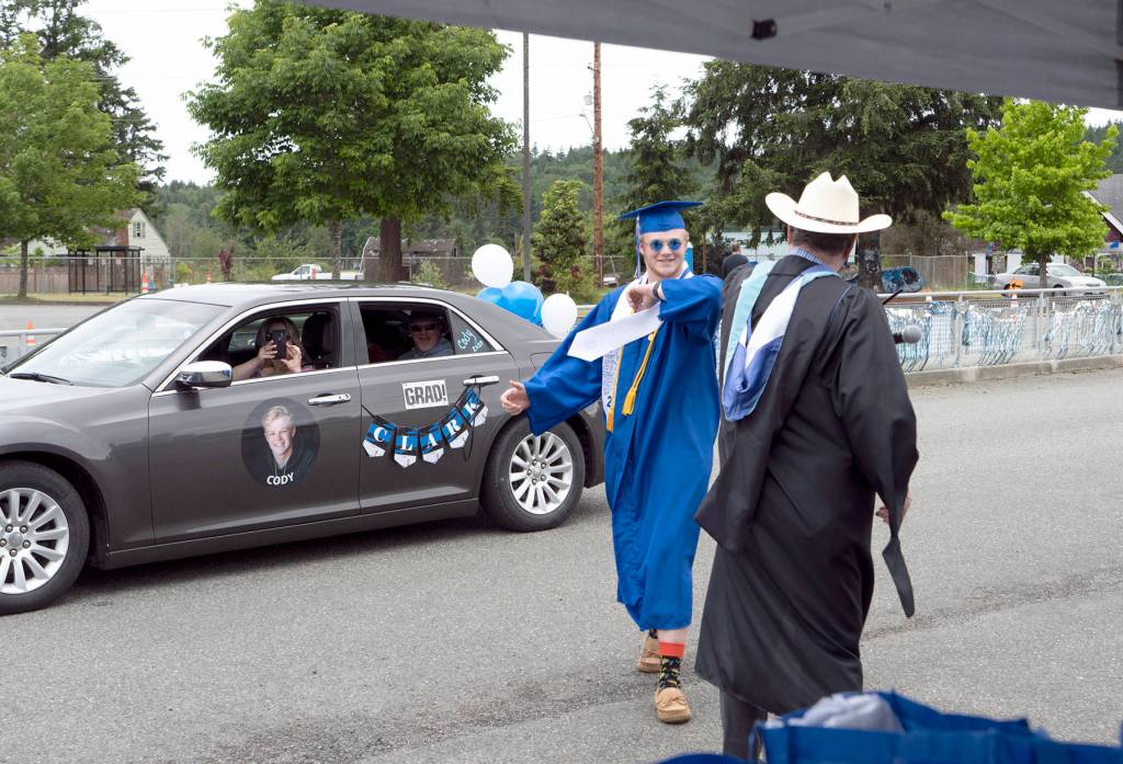 Peninsula graduates cheered Friday in drive by festivities