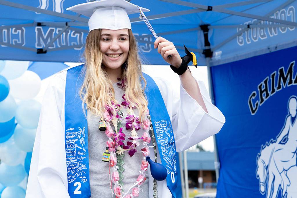 Peninsula graduates cheered Friday in drive by festivities