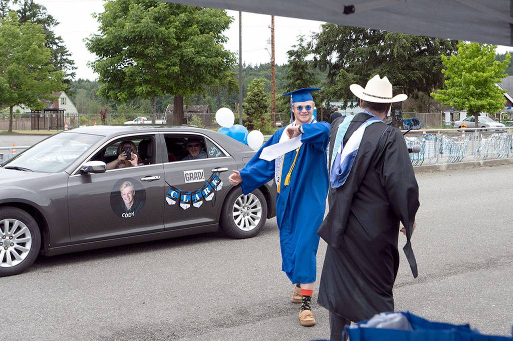 Peninsula graduates cheered Friday in drive by festivities