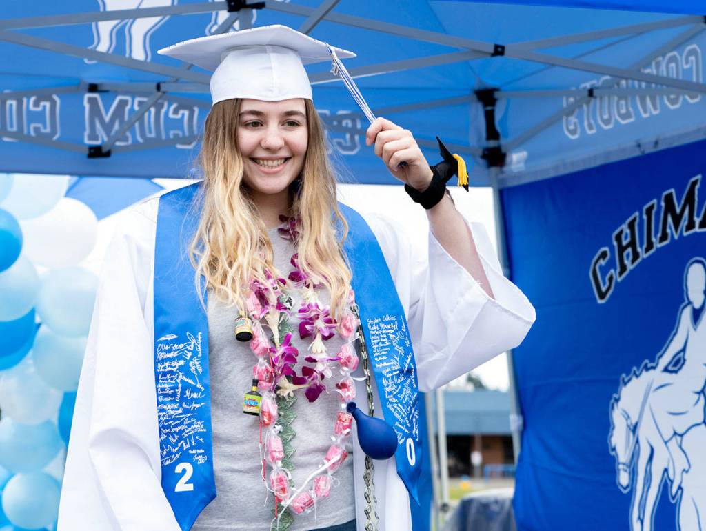Peninsula graduates cheered Friday in drive by festivities