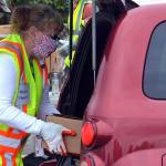 Volunteers distribute food boxes in Sequim, Port Angeles