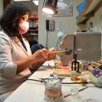 Lien Trinh, owner of DentureCare Inc., prepares some dentures for patients at her West Spruce Street business. Shes one of many Sequim businesses receiving a business grant from the City of Sequim to help during the pandemic. (Matthew Nash/Olympic Peninsula News Group)