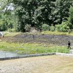 A fire burned a 100- by 30-foot section of grass near the Lower Elwha Tribes fish hatchery on Sunday. The fire was extinguished by a bucket brigade and Clallam County Fire District No. 2. (Jay Cline/Clallam County Fire District No. 2)