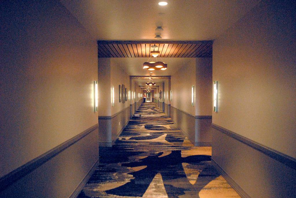 A hallway on the 7 Cedars Hotels top floor is decorated with themed art and carpeting as the facility nears completion. (Keith Thorpe/Peninsula Daily News)