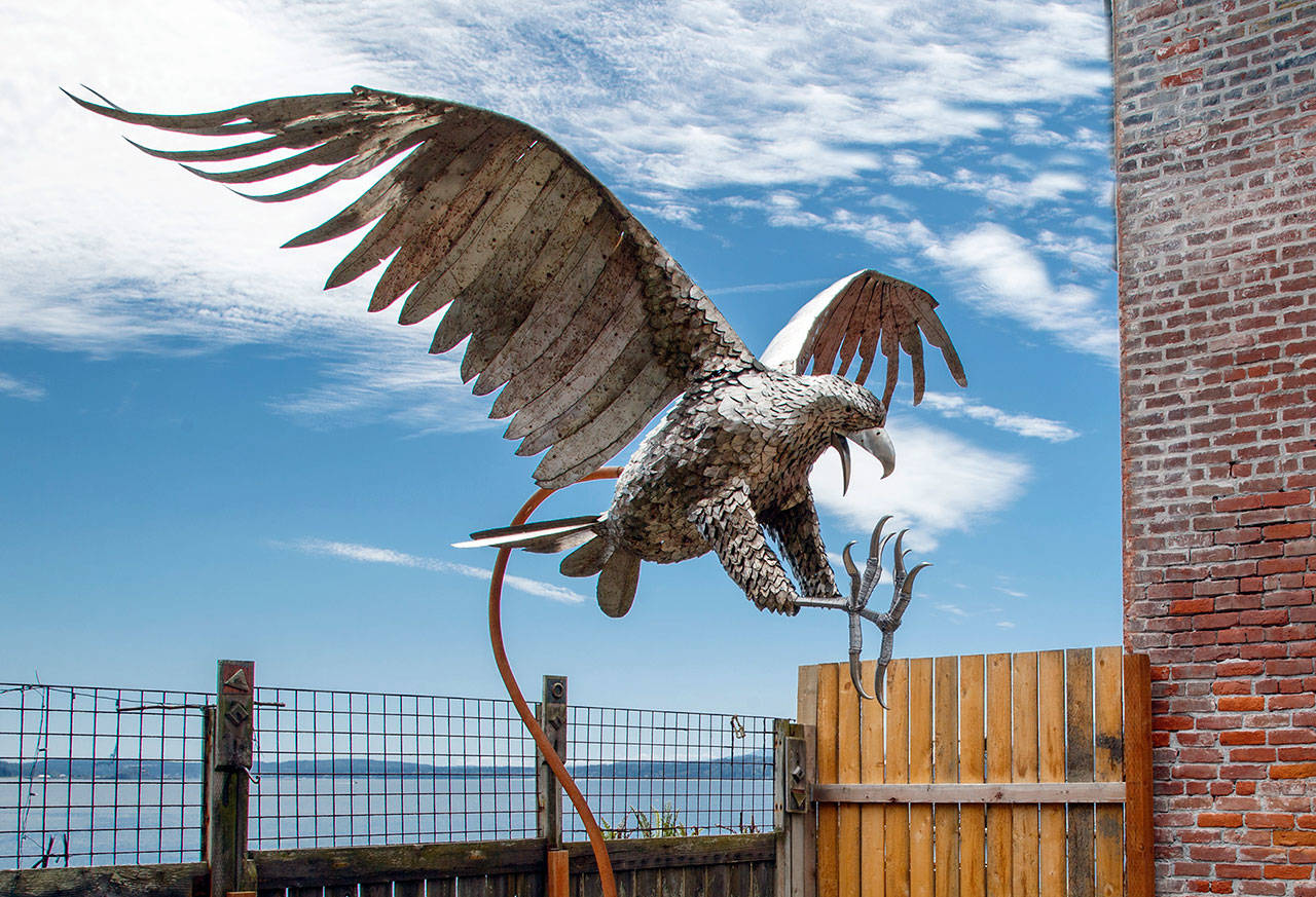 Gary Neals depiction of an eagle on the hunt hangs above the Garden Gallery.