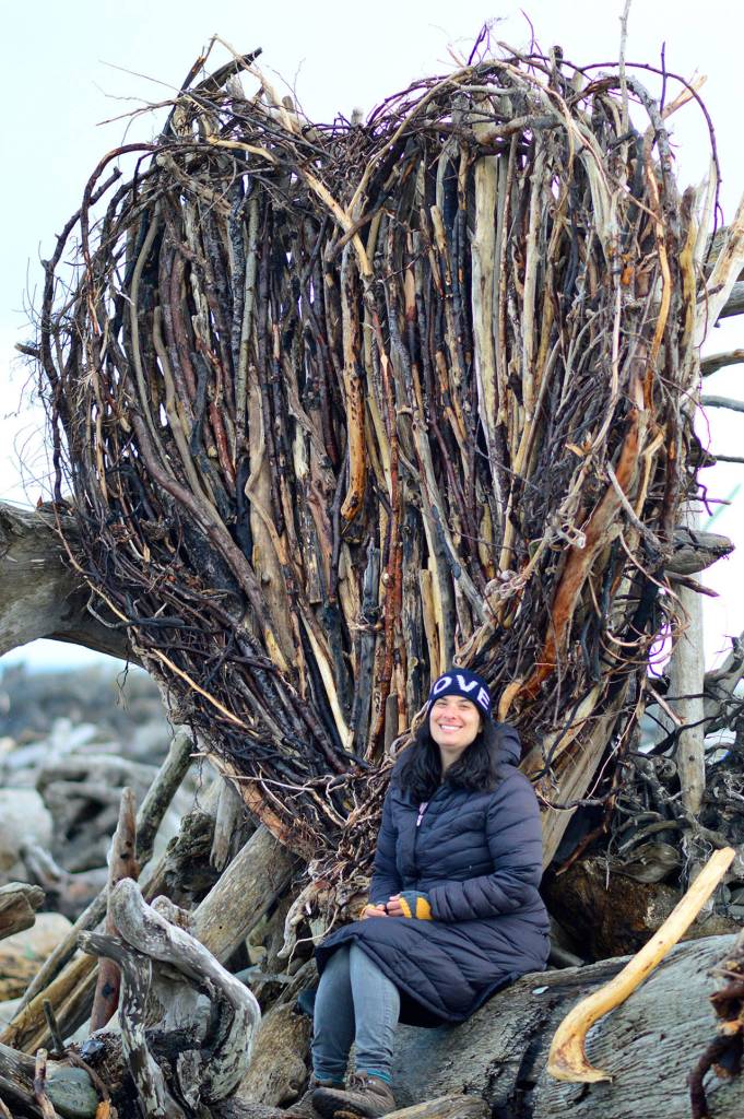 Sahrah Brown of Victoria created the driftwood heart on Ediz Hook in 2015. (Peninsula Daily News file)