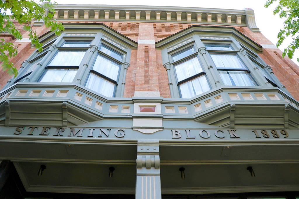The bay windows of the Belmont extend over Water Street. (Ken Park/Peninsula Daily News)