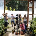 A look down the runway reveals a number of photographers and videographers shooting models for Impact Fashion, a fashion show highlighting designers focused on sustainable clothing and accessories. (Matthew Nash /Olympic Peninsula News Group)