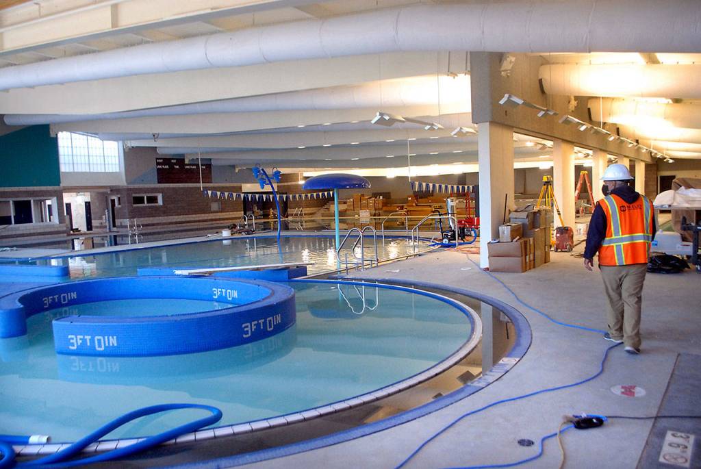 William Shore Memorial Pool District executive director Steve Burke walks past one of four pools during a tour of the Shore Aquatic Center in Port Angeles on Thursday, Aug. 27, 2020. (Keith Thorpe/Peninsula Daily News)
